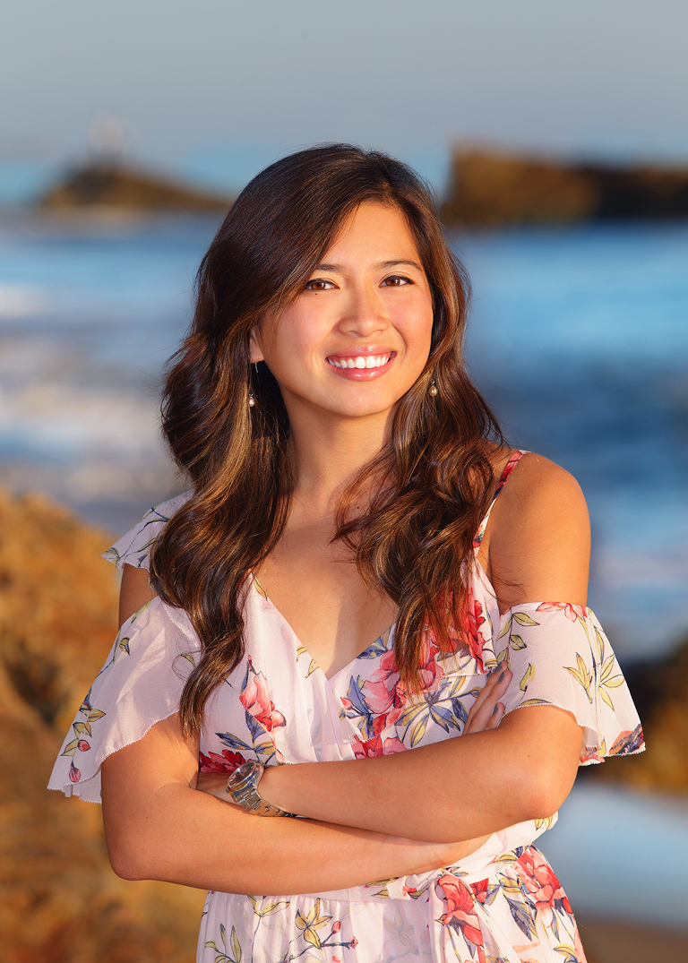 headshot woman on beach