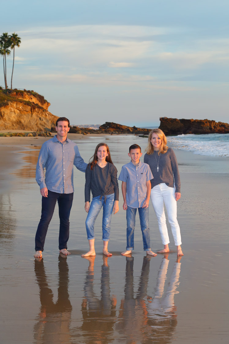 family on beach by Lorin Photography